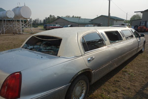 Canada hail damage photo four, limo with extensive damage