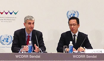 AIR's Dr. Milan Simic and Jerry Velasquez, UNISDR Chief of Section, Advocacy and Outreach, present preliminary findings of AIR's study at the WCDRR in Sendai, Japan
