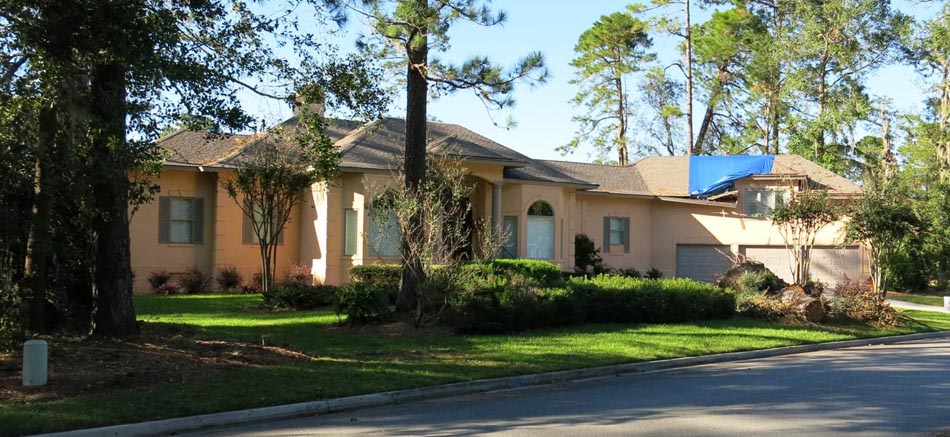 Roof damage due to a fallen tree