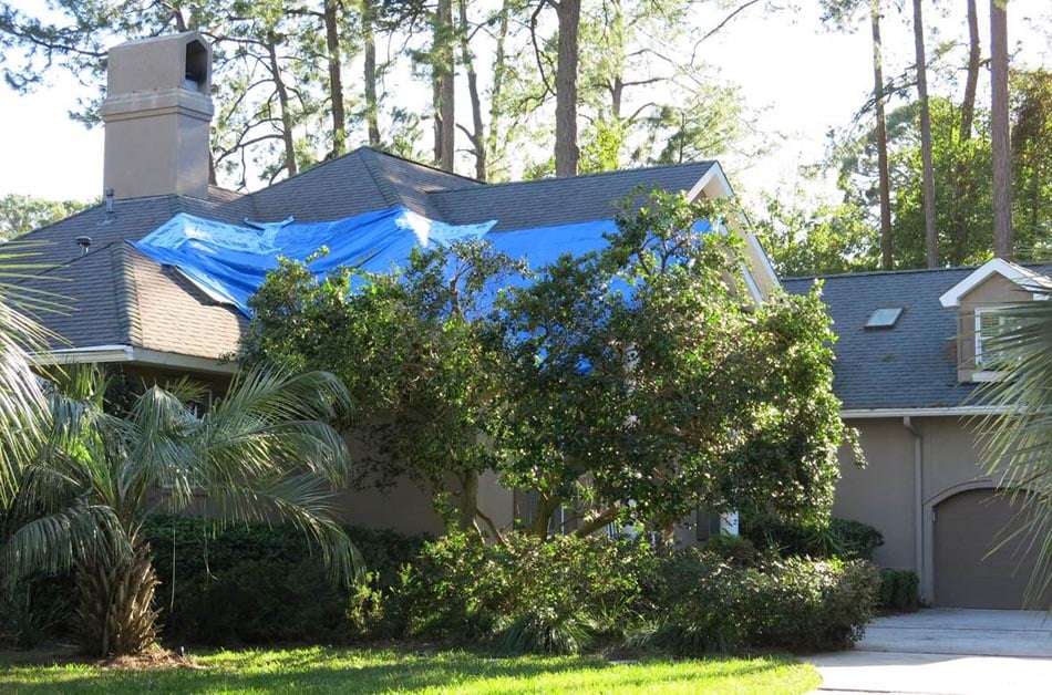 Roof damage due to a fallen tree