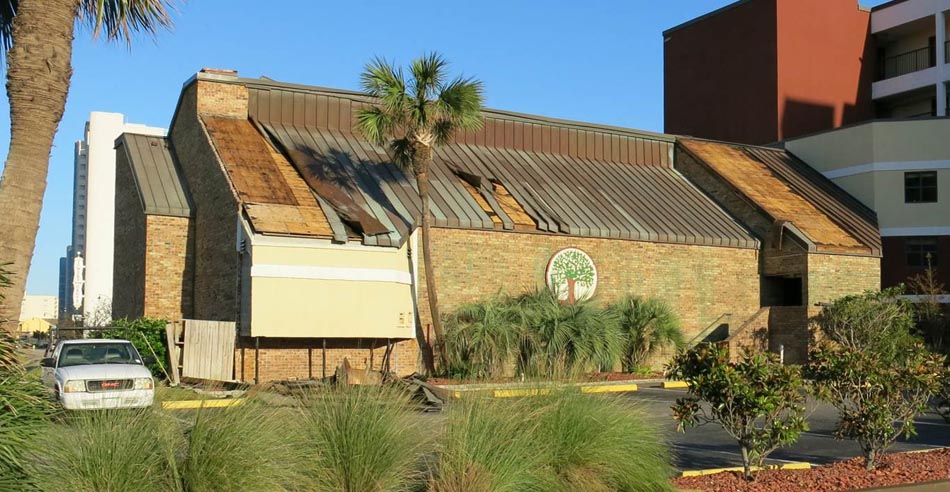 Missing roof covering exposing deck of a beachfront resort